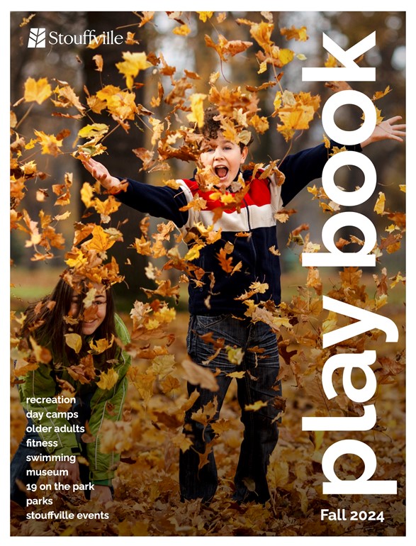 cover of Fall 2024 Playbook with boy playing in leaves